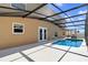 A screened-in pool with clear blue water at 1705 Ridgemoor Dr, Mascotte, FL 34753