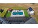 Aerial view of a pool and cabana in the backyard of a home with solar panels at 17117 Heartwood Loop, Winter Garden, FL 34787
