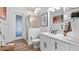 Modern bathroom featuring glass shower, sleek fixtures, and stylish decor at 17117 Heartwood Loop, Winter Garden, FL 34787