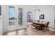 Dining area features a modern light fixture and large window that provides natural light at 17117 Heartwood Loop, Winter Garden, FL 34787