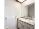 Bathroom featuring granite countertops, a large mirror, and white cabinets at 1738 Athens Ct, Lakeland, FL 33803