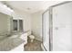 Clean bathroom featuring a shower and a vanity with updated finishes and ample counter space at 1738 Athens Ct, Lakeland, FL 33803