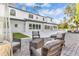 Inviting outdoor patio with brick pavers and comfortable wicker seating, perfect for relaxing and entertaining at 1943 Wingfield Dr, Longwood, FL 32779