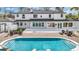 This backyard features a pool, patio, and a large white house at 1943 Wingfield Dr, Longwood, FL 32779