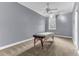 This bedroom features carpet flooring, a ceiling fan, and a window at 1943 Wingfield Dr, Longwood, FL 32779