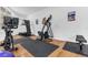 This gym features hardwood flooring and various exercise machines at 1943 Wingfield Dr, Longwood, FL 32779