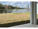 Backyard view of the lake from the covered lanai at 2036 Iorio Dr, St Cloud, FL 34771