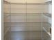 A well-organized pantry is equipped with metal shelving at 2036 Iorio Dr, St Cloud, FL 34771