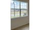 Bright interior view of a spacious window showing a nice green neighborhood view at 2036 Iorio Dr, St Cloud, FL 34771