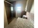 Bathroom with a tiled walk-in shower, a white cabinet, and granite countertops at 204 W Cottesmore Cir, Longwood, FL 32779