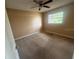 Cozy bedroom features neutral walls, carpet flooring, and ample natural light at 204 W Cottesmore Cir, Longwood, FL 32779