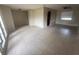 Spacious living room featuring tile flooring, a ceiling fan, and a bright, open space at 204 W Cottesmore Cir, Longwood, FL 32779