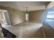 The open living space features tile floors and neutral paint at 204 W Cottesmore Cir, Longwood, FL 32779