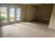 Bright living room featuring tile flooring and large windows at 204 W Cottesmore Cir, Longwood, FL 32779