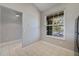 Bright breakfast nook with tiled floors, a window with natural light, and views to other rooms at 2808 Osprey Cove Pl # 202, Kissimmee, FL 34746