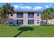 Multi-Gathering home with a spacious lawn area, balconies and beautiful swaying palm trees at 2808 Osprey Cove Pl # 202, Kissimmee, FL 34746