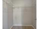 Walk-in closet with shelves, carpet, a rod for hanging clothes, and neutral paint at 2808 Osprey Cove Pl # 202, Kissimmee, FL 34746