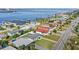 An aerial view of waterfront homes, each boasting unique architecture and access to tranquil waterways and private boat docks at 3226 S Peninsula Dr, Daytona Beach Shores, FL 32118