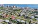 Picturesque aerial view of neighborhood near beach, with skyline backdrop and lush tree coverage at 3226 S Peninsula Dr, Daytona Beach Shores, FL 32118
