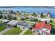 An aerial view of single-story home showcasing its location in a waterfront residential neighborhood at 3226 S Peninsula Dr, Daytona Beach Shores, FL 32118
