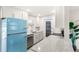 Updated kitchen with stainless steel appliances, stone countertops, and plenty of cabinet space at 3226 S Peninsula Dr, Daytona Beach Shores, FL 32118