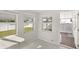 Bright sunroom features hexagon tile flooring and lots of windows overlooking the backyard at 3226 S Peninsula Dr, Daytona Beach Shores, FL 32118
