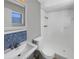 Bathroom with modern fixtures and a walk-in shower at 4112 Grove Pl, Lakeland, FL 33810