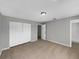 Bedroom with closet, neutral walls, and carpet providing a serene atmosphere at 4112 Grove Pl, Lakeland, FL 33810