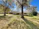 Charming single-story home featuring blue shutters and a well-maintained front yard at 4112 Grove Pl, Lakeland, FL 33810