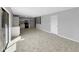 Open concept design integrating the kitchen with bar top and spacious living area at 4112 Grove Pl, Lakeland, FL 33810