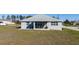 Beautiful shot showing the home's exterior and patio within its lot at 4590 Sw 99Th St, Ocala, FL 34476