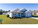 Lovely single-story home featuring a neatly landscaped yard and a two-car attached garage at 4590 Sw 99Th St, Ocala, FL 34476