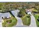 An aerial view of a home with a well manicured lawn and a two car garage at 4721 Tara View Road, Leesburg, FL 34748