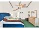 This bedroom features a ceiling fan, a king size bed and a light wood dresser at 4721 Tara View Road, Leesburg, FL 34748