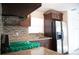 Eat-in kitchen with granite countertops, stainless steel appliances, and tile floors at 4840 Transport Rd, Bartow, FL 33830