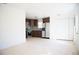 Kitchenette featuring a stainless fridge and mosaic tile backsplash at 4840 Transport Rd, Bartow, FL 33830