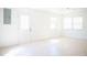 Well-lit room with tile floors, a ceiling fan, and neutral paint at 4840 Transport Rd, Bartow, FL 33830
