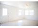 Bright room with tile floors, a door to the exterior, and neutral paint at 4840 Transport Rd, Bartow, FL 33830