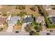 Aerial view of the home, situated among beautifully landscaped properties in the suburban community at 5006 Legacy Oaks Dr, Orlando, FL 32839