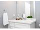 Stylish bathroom with a vanity, sleek white counters and modern fixtures at 5006 Legacy Oaks Dr, Orlando, FL 32839