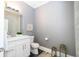 Chic bathroom featuring marble accents, modern fixtures, and ample lighting at 5006 Legacy Oaks Dr, Orlando, FL 32839