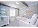 Beautiful Bedroom with cloud lights, stars and a cozy sitting area at 5006 Legacy Oaks Dr, Orlando, FL 32839