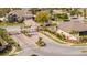 An entrance of the Legacy community with brick pillars, iron gates, and lush landscaping at 5006 Legacy Oaks Dr, Orlando, FL 32839