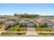 Charming home with well-manicured lawn and landscaping, complemented by a serene lake view in a picturesque neighborhood at 5058 Sparkling Water Way, Kissimmee, FL 34746