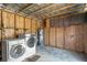 Laundry room with washer, dryer, and water heater at 519 Pearl St, Mascotte, FL 34753