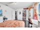 Bedroom featuring closet, ensuite bathroom, desk and natural light at 639 Mesilla Dr, Kissimmee, FL 34758