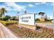 Inviting Lakeview Pointe community entrance sign with manicured landscaping and a charming stone tower on a bright day at 7345 Duxbury Ln, Winter Garden, FL 34787