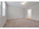 Spacious bedroom with neutral walls and carpet, offering a blank canvas for personalization at 869 Rivers Crossing St, Clermont, FL 34714