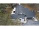 Aerial view of the home featuring solar panels on the roof at 1102 Hamlin Ave, Howey In The Hills, FL 34737