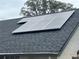 Close-up of solar panels on the roof of the home at 1102 Hamlin Ave, Howey In The Hills, FL 34737